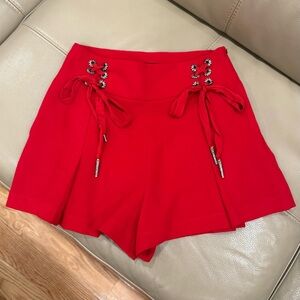 THE KOOPLES Red Lace Up Eyelet Pleated Skirt - size EU 32 (XS-S)